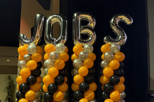 Balloons spelling out the word 'jobs'