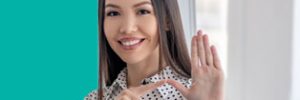 A woman using sign language in recognition of National Deaf Week