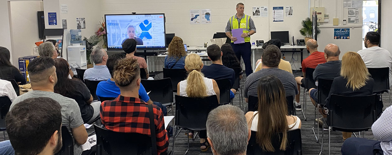 An employer presents opportunities to attendees on the day