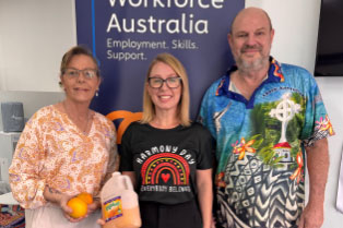 3 of our Lake Haven Team. 1 is wearing a tshirt that says Harmony Day everyone belongs